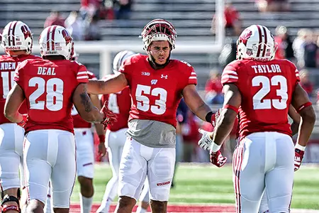 Photo of T.J. Edwards, Jonathan Taylor, Taiwan Deal football vs. Northwestern 2017