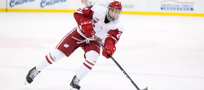 Wyatt Kalynuk passes the puck