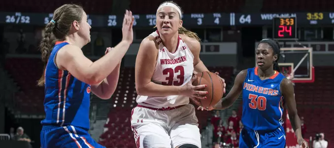 Courtney Fredrickson drives to the basket against a Platteville defender.
