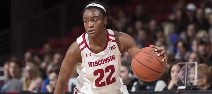 Niya Beverley brings the ball up the court.