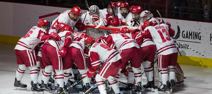 Men's hockey team huddle