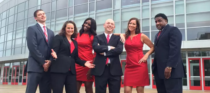 Photo of Jonathan Tsipis and coaches women's basketball 2017