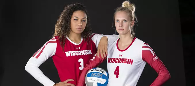 Lauryn Gillis and Kelli Bates pose in front of a black background.