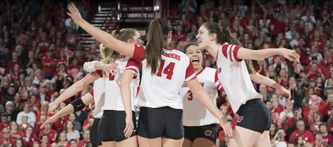 The Badgers celebrate winning a point during the match vs. Nebraska.