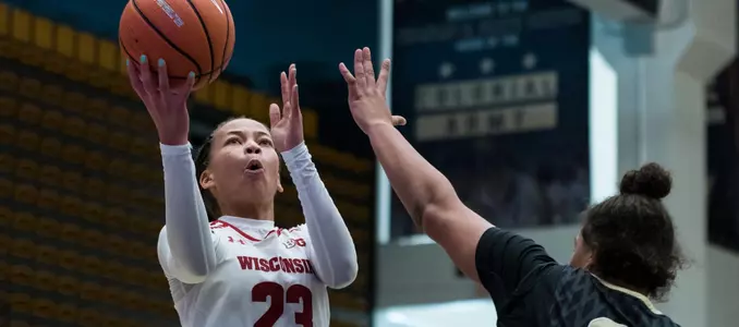 Cayla McMorris shoots over a Vanderbilt defender.