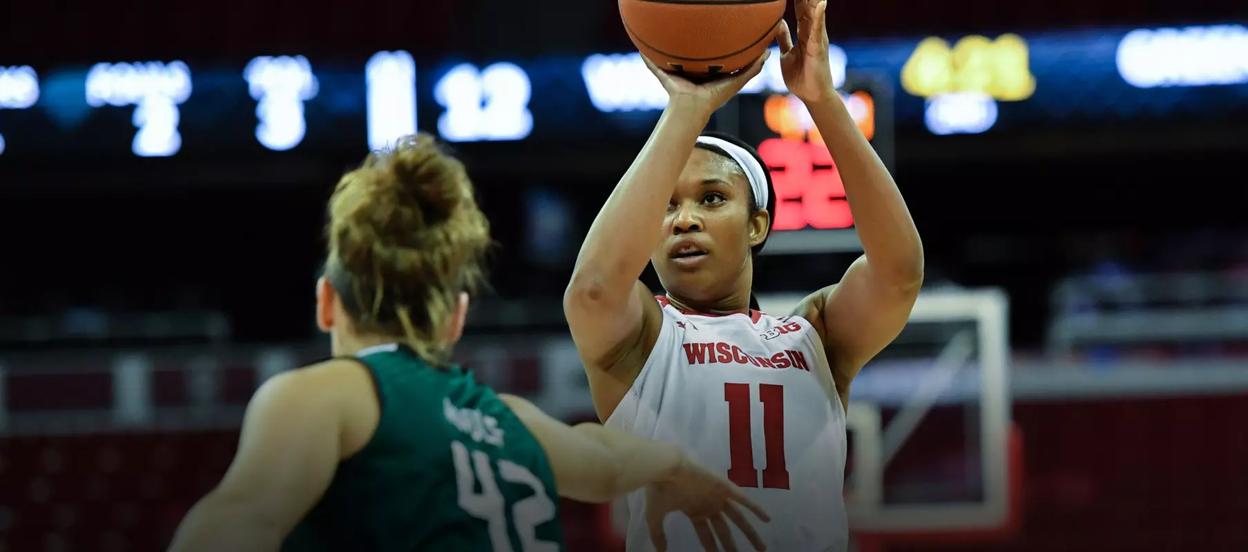Marsha Howard shoots over a Green Bay defender.