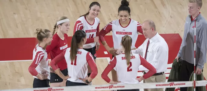 Head coach Kelly Sheffield talks to his team on the court.