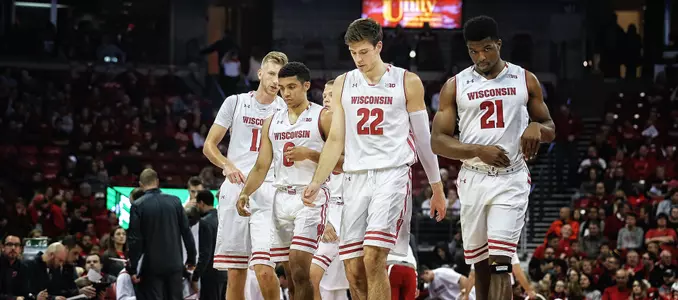 Photo of Ethan Happ, D'Mitrik Trice, Khalil Iverson men's basketball vs. UW-Stout 2017