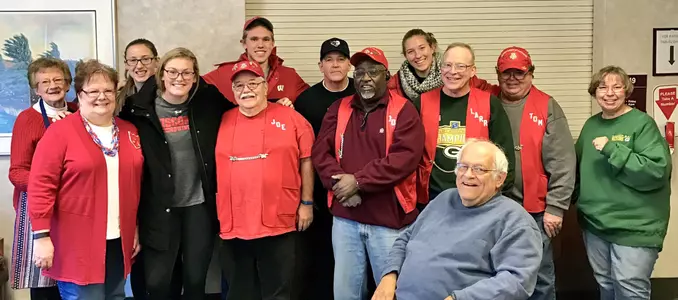 Photo of Badgers Give Back men's and women's rowing student-athletes visit VA Hospital