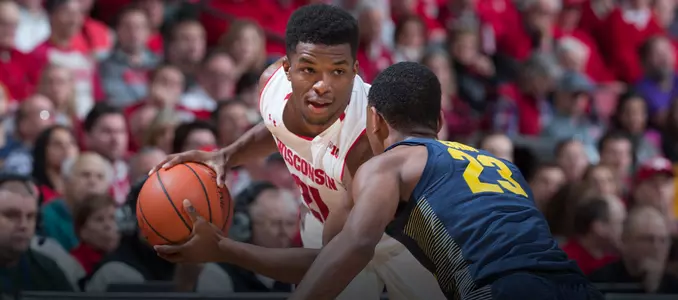 Khalil Iverson stares down a Marquette defender
