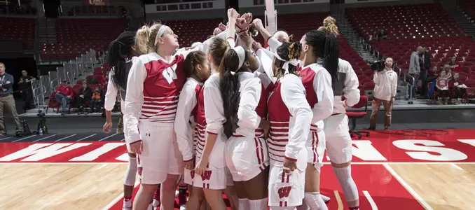 The Badgers team in a huddle