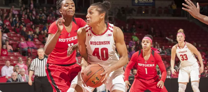Avyanna Young battles two Rutgers defenders