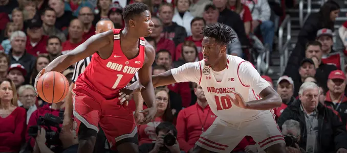 Nigel Hayes defends against Ohio State