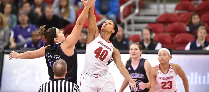 Avyanna Young tips off the game