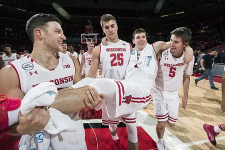 Men's basketball vs. Syracuse 2016 Ethan Happ carried by teammates Zak Showalter, Aaron Moesch, Alex Illikainen