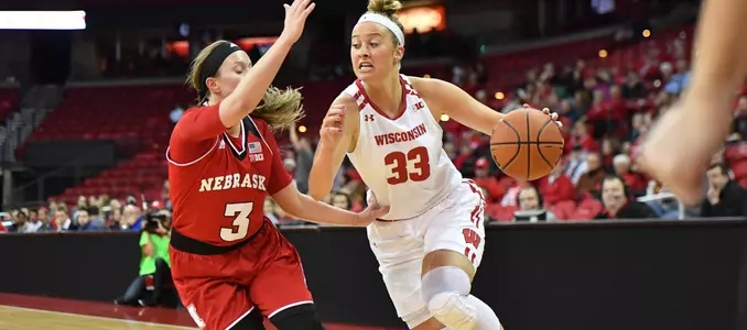 Courtney Fredrickson drives to the basket