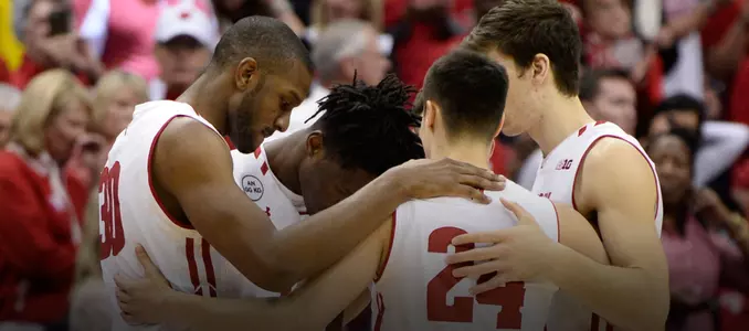 Badgers huddle before a game against Michigan at the Big Ten tournament