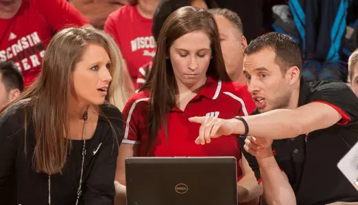 Volleyball coaches on bench