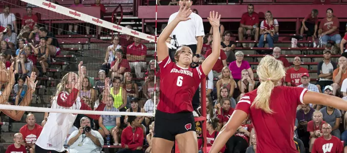 Mallory Dixon sets the ball.