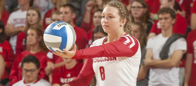 Sarah Dodd serves the ball