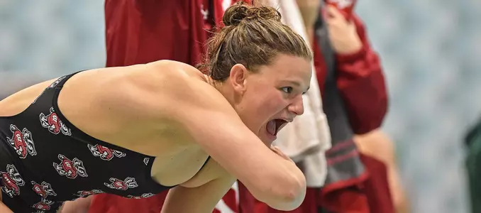 Photo of Cierra Runge cheering versus Green Bay