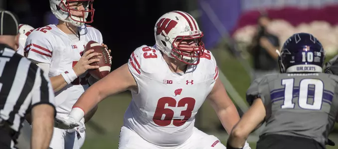 Photo of football vs. Northwestern 2016 offensive lineman Michael Dieter and quarterback Alex Hornibrook