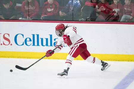 Maddie Rolfes shoots the puck vs. UMD