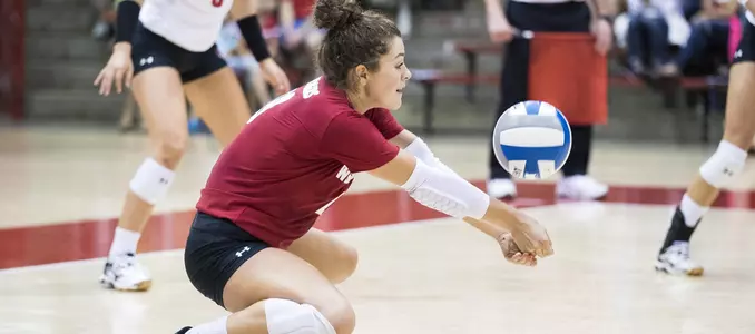M.E. Dodge digs the volleyball during the Cardinal vs. White scrimmage