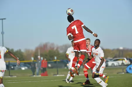Mark Segbers heads a ball vs. Maryland