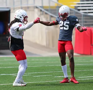Photo of D'Cota Dixon and Derrick Tindal at Football 2017 fall camp practice
