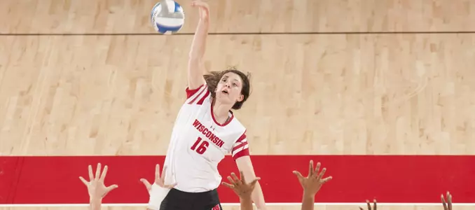 Dana Rettke goes up for a kill out of the center of the court.