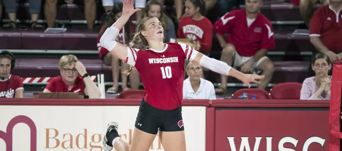 Mariah Whalen goes up for an attack at the net.