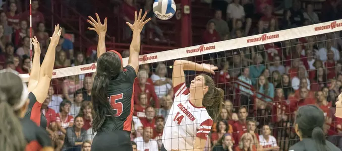 Madison Duello goes up for a kill against Louisville