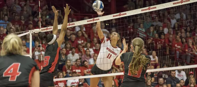 Tionna Williams attacks the volleyball on a slide play.