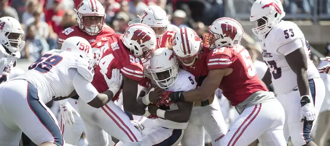 Photo of Wisconsin defensive tackle Chris Orr, Andrew Van Ginkel, T.J. Edwards during football game vs. Florida Atlantic 2017