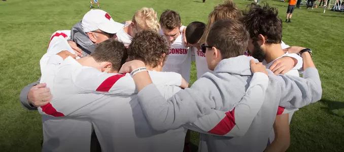 Men's cross country huddle at the 2016 Nuttycombe Invitational