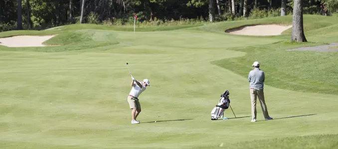 Nick Robinson hits his approach at University Ridge Golf Course during the 2017 Badger Invitational