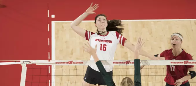 Dana Rettke goes up for a kill against MSU.