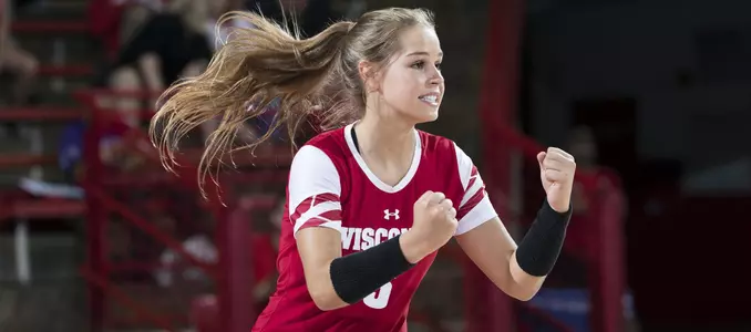 Riley Bell celebrates during a point on the court.