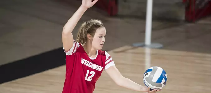 Nicole Shanahan serves up the ball.