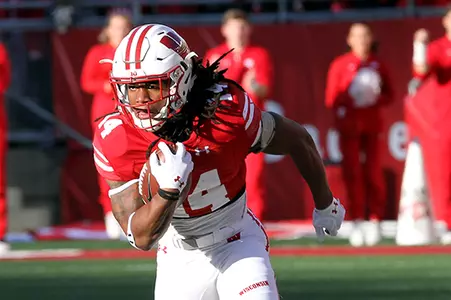 D'Cota Dixon carries the ball after intercerption during football game vs. Illinois 2016