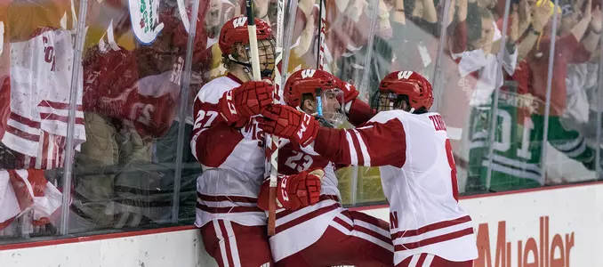 Players celebrate a goal
