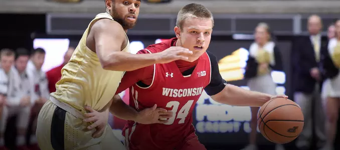 Brad Davison drives with the basketball during a game at Purdue