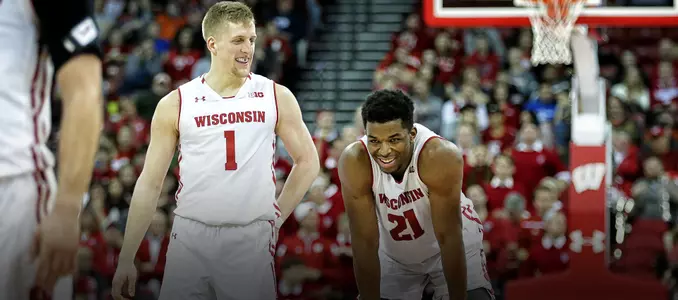 Khalil Iverson and Brevin Pritzl share a smile during a win against Illinois