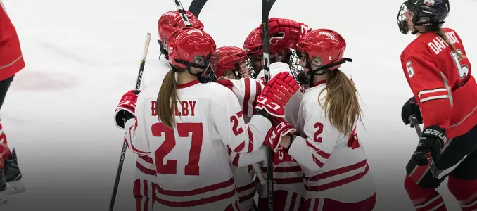 Women's hockey celebrates a goal against Ohio State