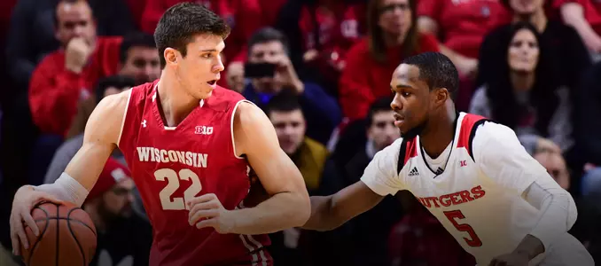 Ethan Happ backs down a defender during a game at Rutgers