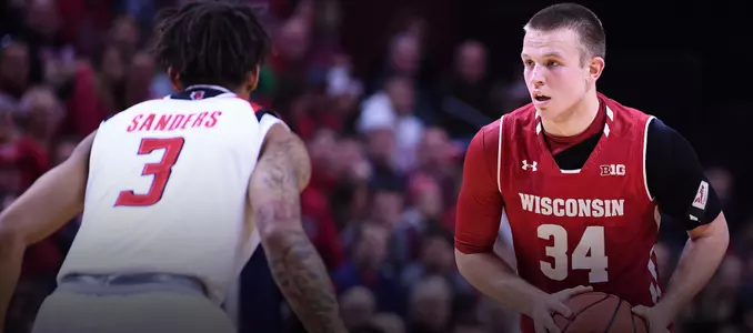 Brad Davison surveys the court during a road game at Rutgers