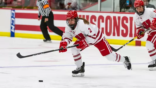 Natalie Buchbinder prepares to shoot the puck in UW's 3-1 win over UMD