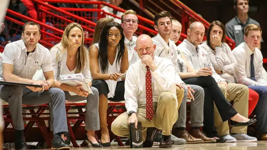 The Badger coaches at the benchduring a match.