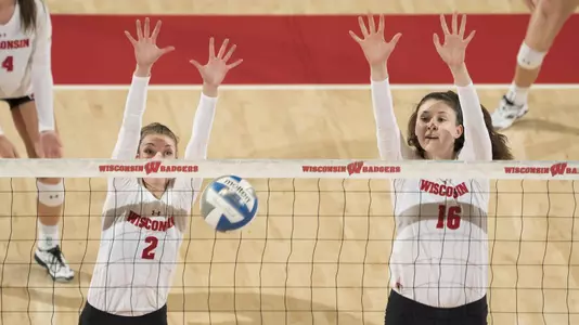 Sydney Hilley and Dana Rettke go up for a block against Ohio State.